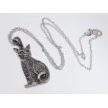 A white metal pendant modelled as a cat and set with pyrite (marcasite), on 44cm chain marked '925'.