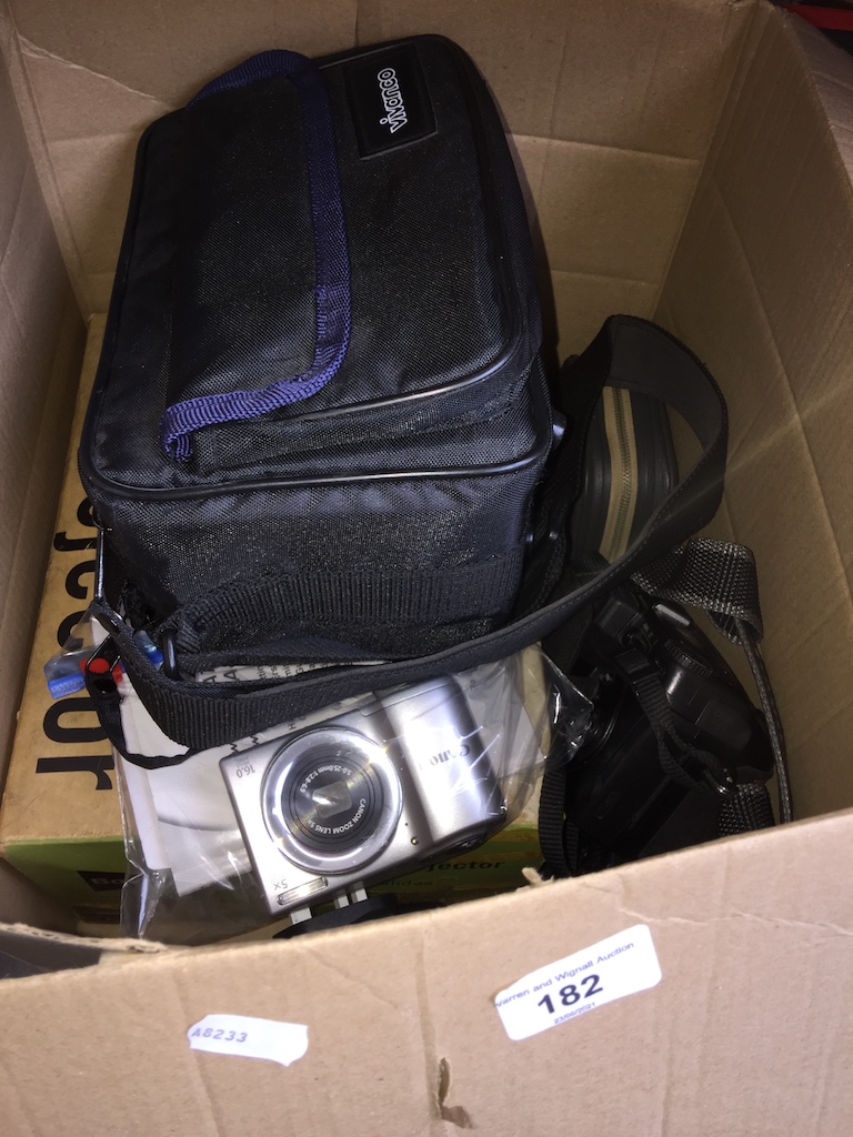 A box of mainly camera related items to include a 1960s slide projector, a cca 1960s Kodak camera, a