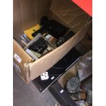 A box containing cameras (Cannon 35mm), cine cameras, developing equipment and a drying rack