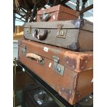 Three vintage luggage cases