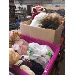 2 boxes of dolls