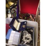 A box containing three boxes of costume jewellery