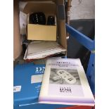 A box of electrical items to include receiver / emitter, a Neuro 4 trophic stimulator, etc.