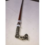 An early 20th century swagger stick with nude figure metal mount/handle