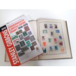A Romanian stamp album and a Stanley Gibbons Commonwealth & British Empire stamp catalogue