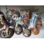 Various ceramics and ornaments to include native indian statues and others.