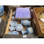 A box of blue jasperware (12 pieces) and five blue jasperware Christmas plates 1970-1974