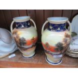 pair of Noritake vases with landscapes - good condition . Ht. 23cm