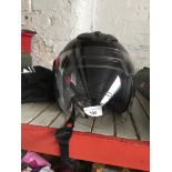 A Box crash helmet with soft carry bag