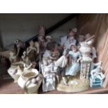 A group of ten continental and other 19th century and later porcelain figures, tallest 33cm,