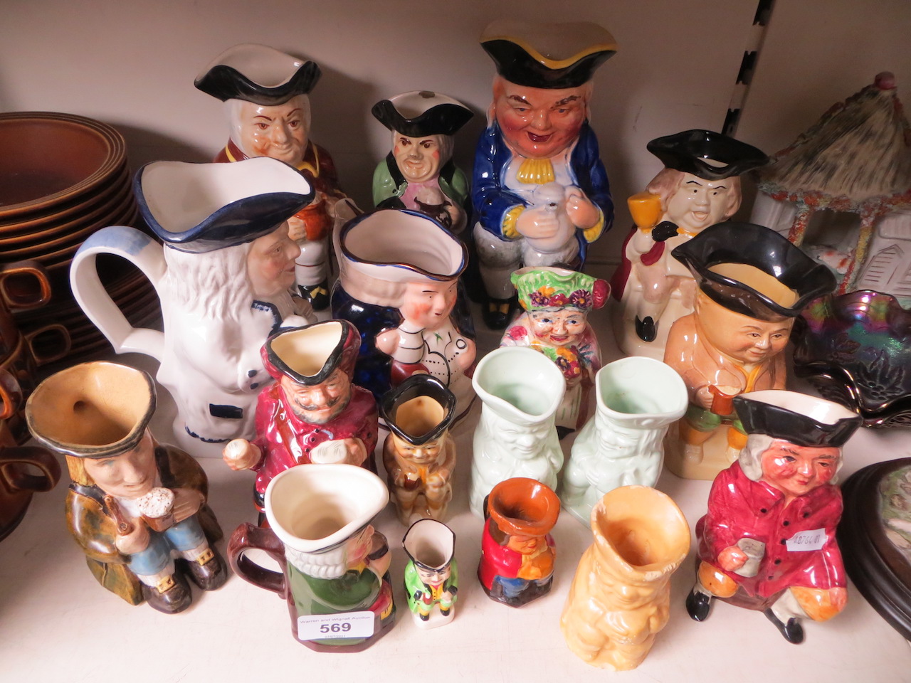 A collection of toby jugs to include 1 Royal Doulton.