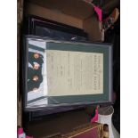 A box of ballet pictures, and a framed certificate from Richmond