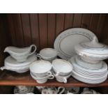 A Chinastyle Kensington dinner service comprising 6 dinner plates, 6 side plates, 6 soup bowls and