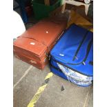 2 suitcases containing material offcuts