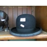 A Dunn & Co London bowler hat size 7