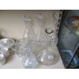 A ships decanter, water jug, and 4 other crystal decanters