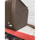 A vintage soft suitcase with lined interior