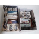 Two boxes of various postcards