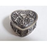 An eastern embossed heart shaped box, length 7.5cm, weight 3oz.