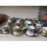 Twelve Noritake porcelain cups and saucers