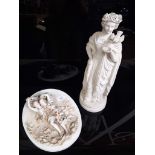 A Parian ware figure of a lady and a Parian ware wall plaque figure group, heights 37cm & 28cm.