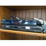 A Panasonic dvd recorder and a Humax digibox with remotes