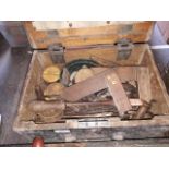 A wooden box of tools including soldering items, t squares etc
