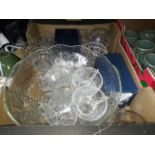 A punch bowl with cups with 12 pieces of crystal including Doulton