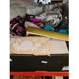 A box containing vintage clothing, materials, shoes and a purse etc.