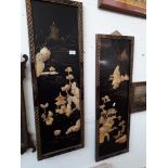 A pair of oriental wall plaques