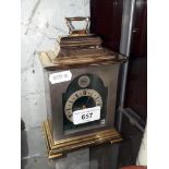A Thwaites and Reed modern brass carriage clock