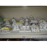 Sixteen Coalport china houses and cottages