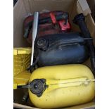 A box of fuel cans and a grease gun