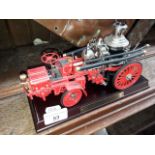 A Franklin Mint 1912 Christie Front Drive Steamer die cast model