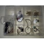 Tub of jewellery inc. gold earrings and chain, silver rings etc.