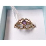 A hallmarked 9ct gold ring with amethyst stone