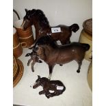 Four Royal Doulton horses - good condition