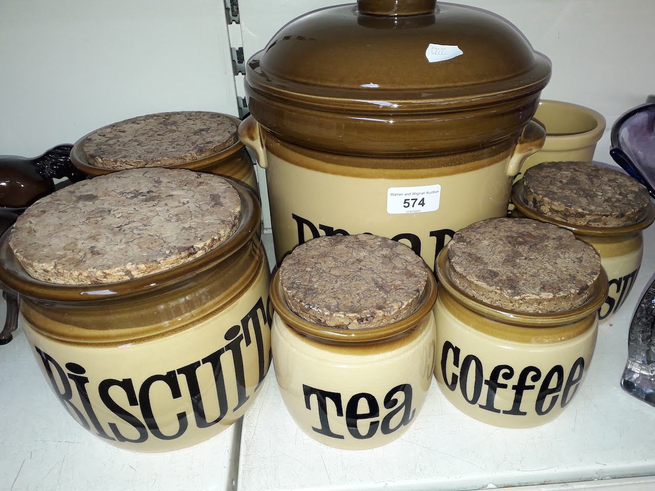 Seven stoneware kitchen jars