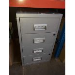 A metal 4 drawer cabinet