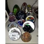 12 glass paperweights including Mdina