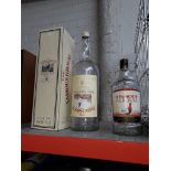 An empty 1.75ltr Grouse whisky bottle and an empty 4.5 ltr Grouse bottle with box
