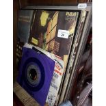 A quantity of pop LPs and singles including Bowie, Beatles etc.