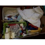 A box of sewing items and textile