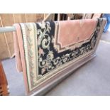 An eastern style carpet approx 280cm x 190cm.