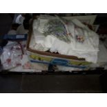 Three boxes of linen, tapestries and embroideries