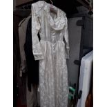 A long white wedding/bridesmaid silk dress