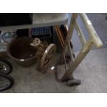 A sack truck, and old bench mounted hand cranked pillar drill, and a large metal bowl