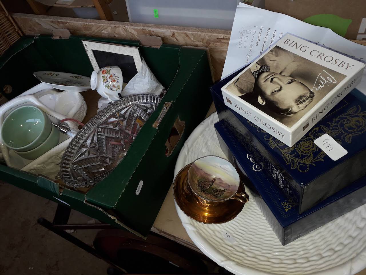 A box of ceramics and glass with Aynsley, Royal Winton, etc together with books, cds and large white