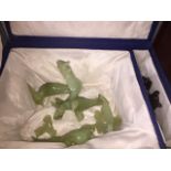 A boxed jade effect ornament - broken - sold as found