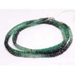 Two strands or faceted emerald beaded necklaces, the emeralds ranging in diameter from approx. 2mm